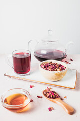 Vibrant Red Hibiscus Tea with Dried Petals