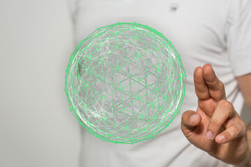 Person interacting with a glowing digital sphere representing global connection and modern technology. Ideal for concepts like communication and