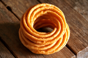 Crispy Traditional Indian Murukku Snack on Rustic Wooden Background