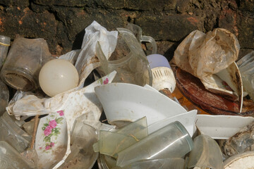 A pile of broken plates and glass cups. For graphic design, 3D rendering and banners