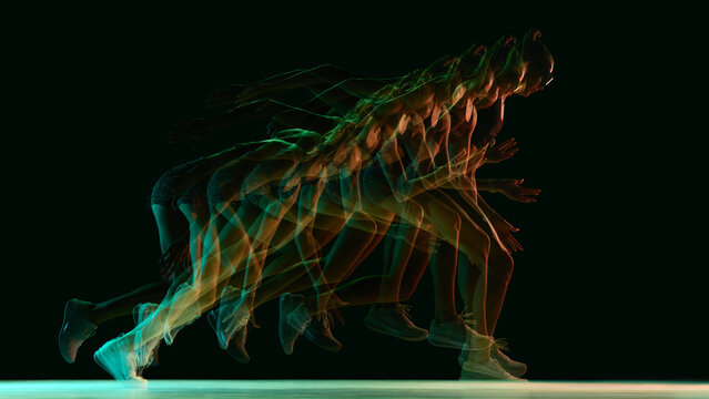 Multi-exposure running sequence showing athlete acceleration in neon light. Concept of performance diagnostics, sprint mechanics guides, movement breakdowns, and sports science presentations. - Powered by Adobe