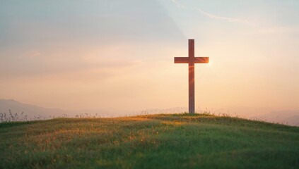 Wooden Cross Silhouette at Sunset on a Pastoral Hilltop Landscape