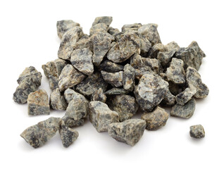 Crushed stone gravel pile isolated on white background