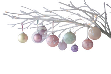 Elegant Assortment of Pastel Christmas Ornaments Hanging on White Decorative Branches for Holiday Decor