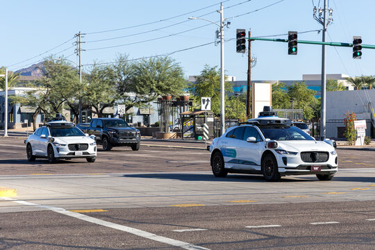 Waymo self-driving cars autonomous driving by Google and Jaguar robotaxi in Phoenix, United States