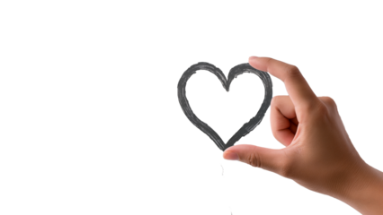 A hand holds a drawn heart. Concept of love, care, and health. Isolate.