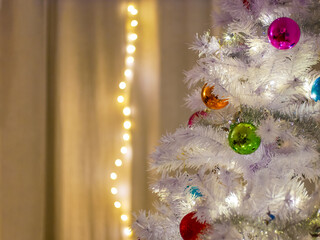 White Christmas Tree with Colorful Ornaments