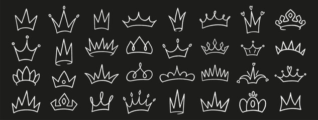 Crowns crayon icons set. King or queen crown, doodle. Hand drawn prince and princess head accessories. White line art royal diadem, majestic tiara on black bg. Sketch of luxurious symbols, vector
