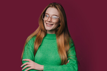 Friendly Female Professional With Vibrant Style, Happy Redheaded Woman Dressed In Green With Warm Smile