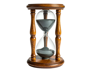 Classic hourglass with dark sand on wooden stand, black background