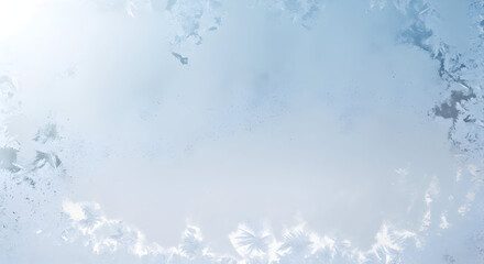 Delicate ice crystal patterns on a window pane revealing the beauty of winter s touch