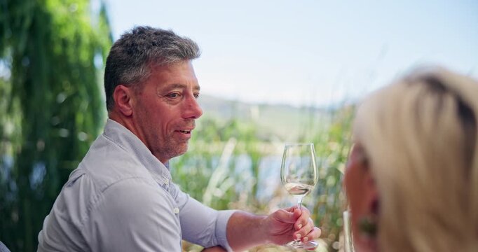 Love, wine tasting or couple at lake with glass, connection or flavor sampling for anniversary. Honeymoon, mature man and woman in nature with drink, bonding or beverage evaluation on date at winery