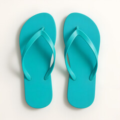 Stylish turquoise flip flops on a light background for summer fashion and beachwear
