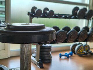 Dumbbells on a gym. ready for free weight training, with copy space.