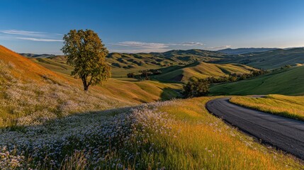 Rolling Green Hills Landscape With Winding Path And Lone Tree Under Clear Blue Sky