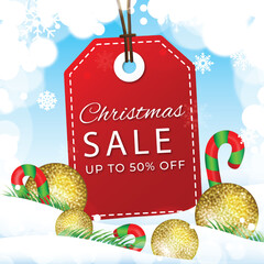 Red Christmas sale tag with sparkling ornaments, gold balls, and winter decor against a snowy background. Ideal for seasonal promotions, holiday advertising, and festive product displays.