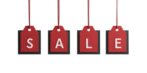 Red sale tags displayed in a horizontal line on white background
