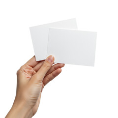 Fototapeta premium Macro close-up of a slender female hand holding two blank white matte a6 presentation cards against a transparent, high-key studio background. Ultra-photorealistic commercial mockup concept