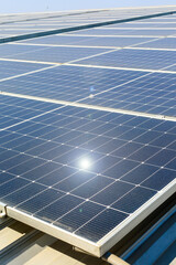 Photovoltaic solar power panel on blue sky ,green clean alternative energy. environmentally friendly. Clean energy and environment. 