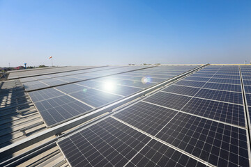 Photovoltaic solar power panel on blue sky ,green clean alternative energy. environmentally friendly. Clean energy and environment. 