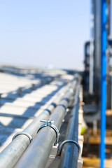 Good manage network electric cable with metal flex pipe. Isolated on white background. Installation of electrical wiring on wall. Electrical cable system installation.