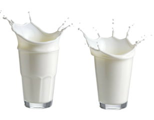 Two clear glasses of white liquid with big splashes, isolated