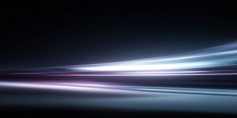 Streaks of vibrant light motion blur across a dark, smooth surface.