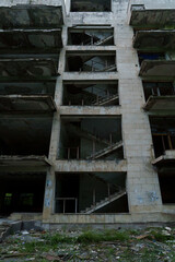 Interior stairwell of abandoned multi storey concrete hotel