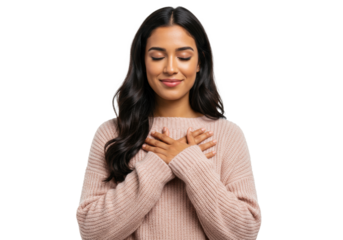 Young hispanic woman, light pink knit sweater, dark wavy hair, smiling sincerely with closed eyes, hands pressed to heart on a transparent background, soft beauty light. Concept of deep appreciation