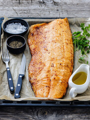 roasted whole salmon fillet on baking sheet