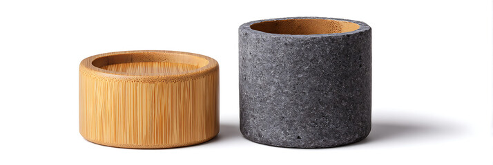 Two small round cylindrical containers made of bamboo wood and grey concrete isolated on white background, eco-friendly storage pots