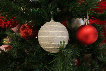 Christmas tree decorated with ornaments and festive holiday decorations