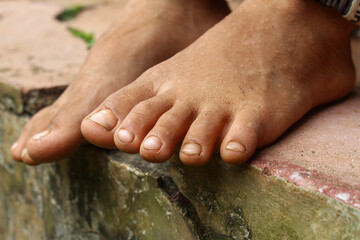 Close up of bare feet of a small child without shoes