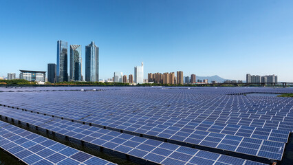 Urban solar panel installation with modern buildings in the background