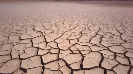 Stunning cracked earth landscape showing drought conditions and climate change effects, perfect for environmental and ecological awareness campaigns