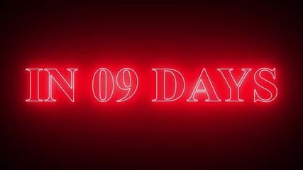 Red neon sign in 09 days against dark background