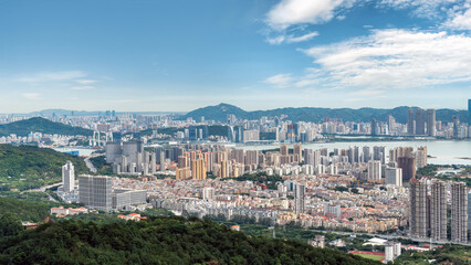 Panoramic view of modern urban cityscape with buildings and river