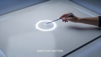 A hand holds a precision pointer aiming directly at a central glowing target on a sleek digital surface, emphasizing strategic focus. The text "DIRECTION MATTERS" reinforces the theme of goal-oriente