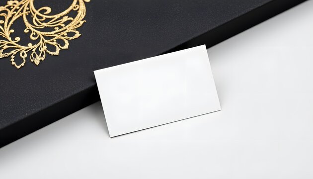 Blank Business Card Mockup: A simple business card rests on an elegant, luxurious black surface, offering a sleek, minimalist canvas for showcasing brand identity. 
