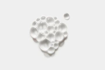 Cosmetic cream milk foam texture milky white colored beauty product background