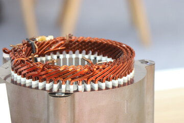 Winding of flat wire motor that is used inside electric vehicle motors close up view. EV flat winding motor