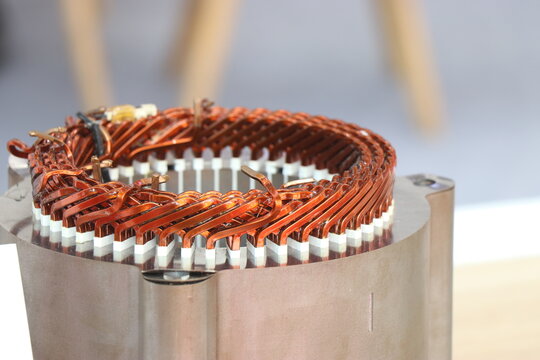 Winding of flat wire motor that is used inside electric vehicle motors close up view. EV flat winding motor