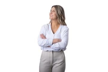 Confident young businesswoman smiling with arms crossed
