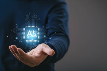 Hand presenting a glowing AI microchip icon with circuit lines, symbolizing artificial intelligence, machine learning, digital innovation, automation, advanced technology in a modern tech environment.