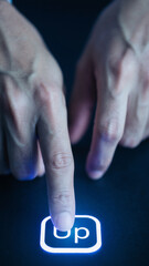 Finger Pressing Glowing Blue Up Button