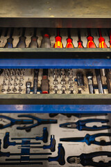 Large collection of sockets, ratchets, and accessories in a case. Professional tools for mechanical workshop and repair.