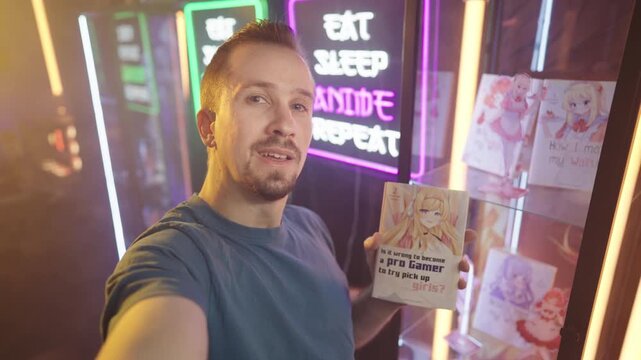 Anime and manga influencer talking about Japanese comic holding in hand 4K