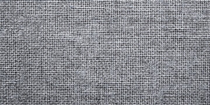 Coarse woven fabric texture displays a neutral gray surface detail