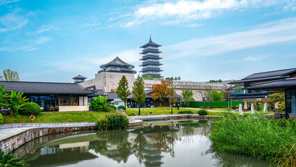 Traditional Chinese architecture with a beautiful pagoda and a calm pond