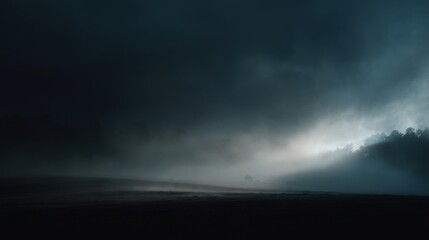 Fototapeta premium Atmospheric landscape with dark clouds filling the sky, subtle gradient from black to lighter shades,
